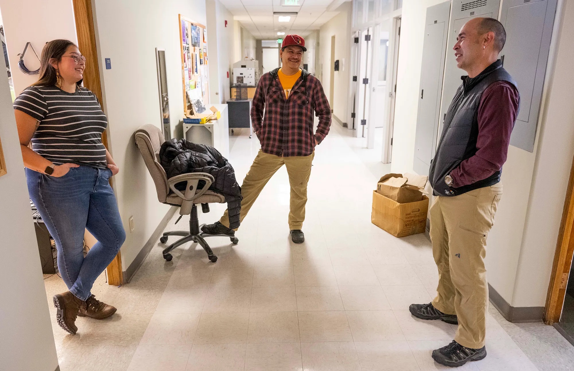 Paske (left) and Thomas chat with Stephan Chase (center), the associate director of Montana American Indians in Math and Science (MT AIMS), which hosts summer camps designed to kindle an interest in STEM careers for middle and high school Native students.