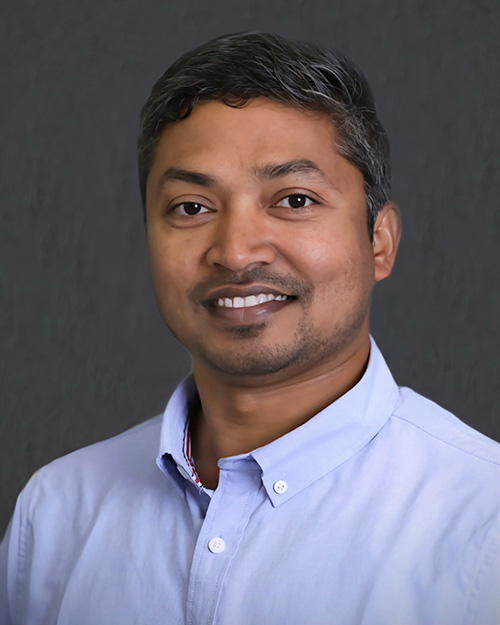 A man smiling at the camera