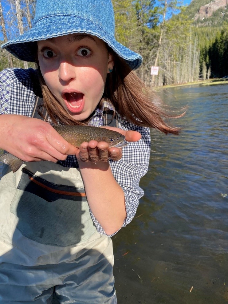 Isabelle Melmer holding a fish!