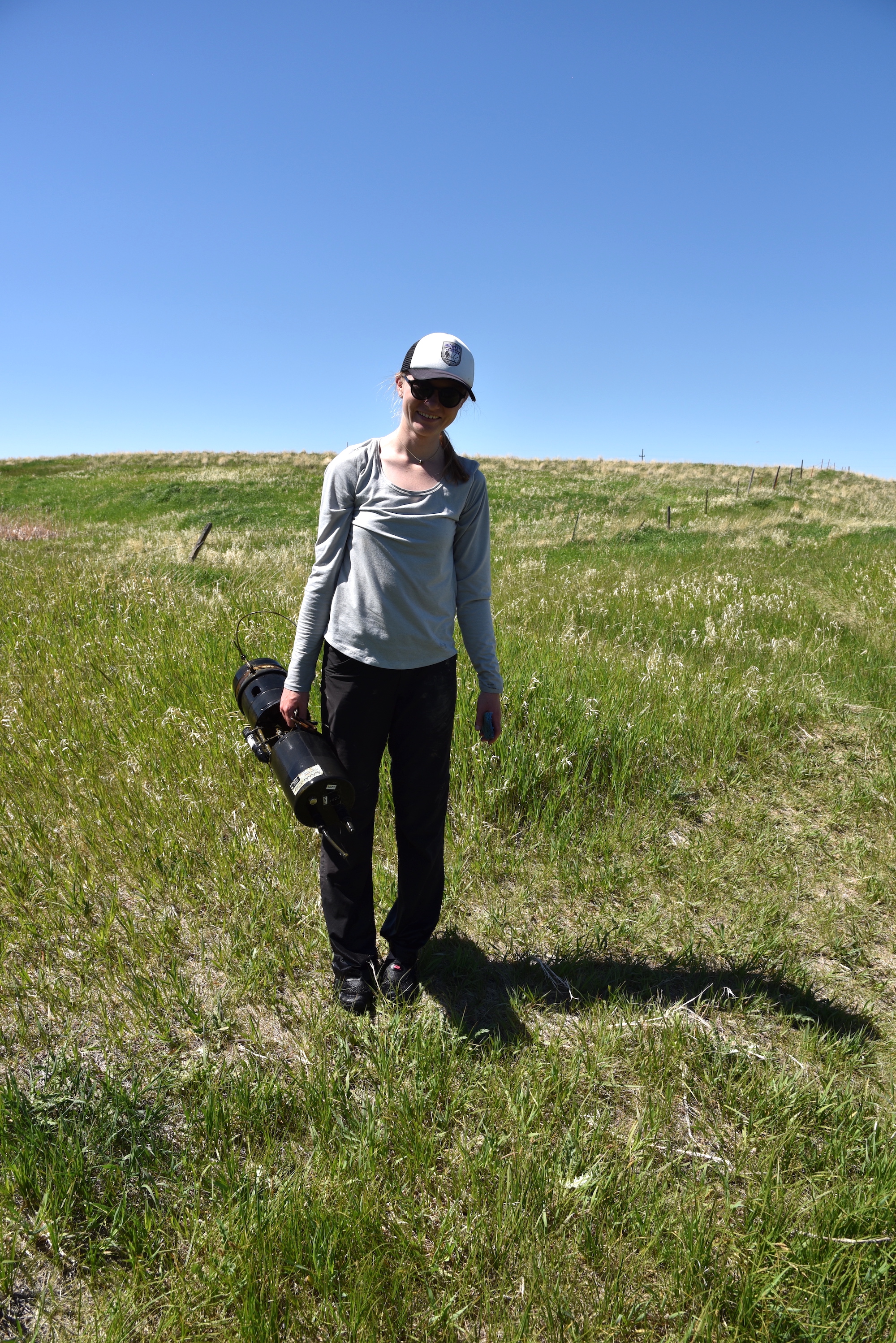 Madison Foster stands with the stream sensor