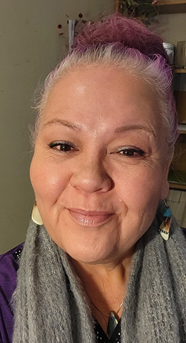 a woman smiling at the camera