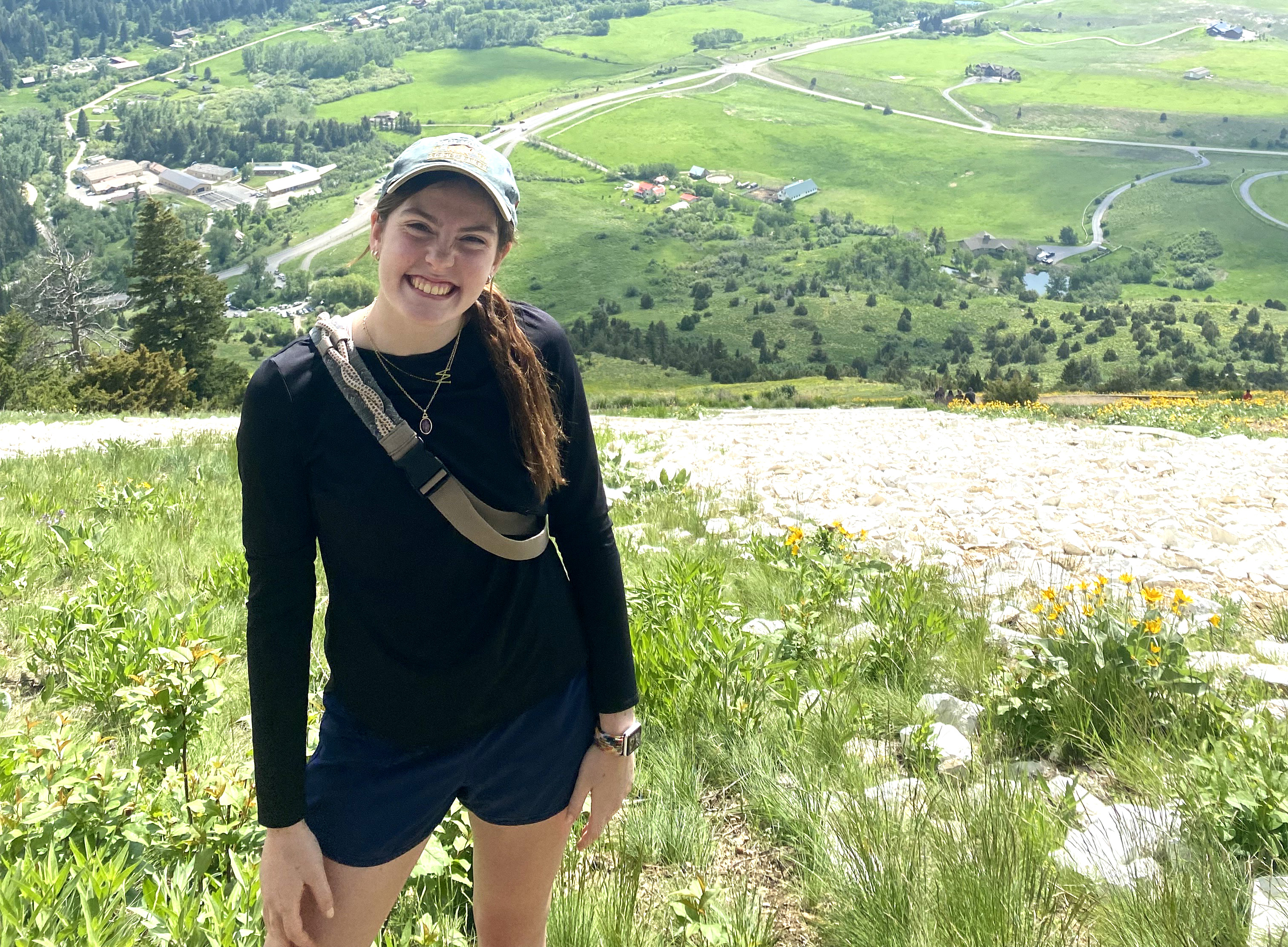 Morgan Hasenmyer outdoors, smiling at the camera