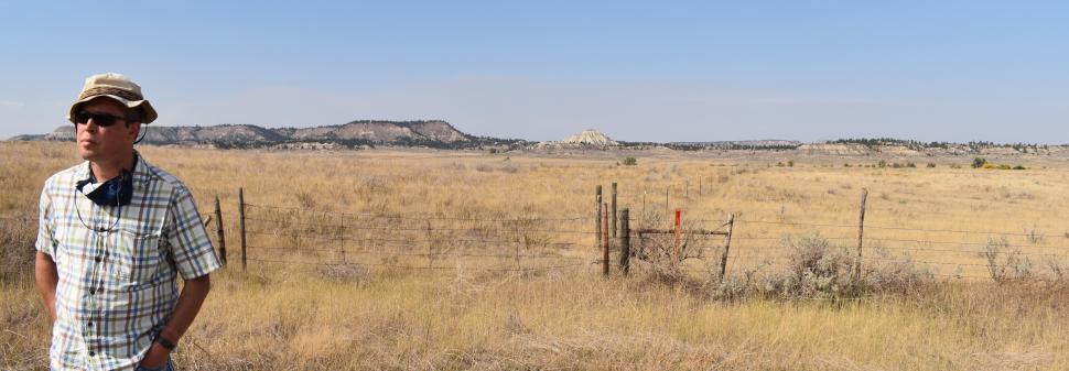 CREWS-PRB lead Rob Walker stands in front of a field in the Powder River Basin