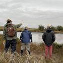 Members of the Upper Clark Fork Working Group survey the river as part of a recent field restoration workshop. Photo credit: Taylor Gold-Quiros