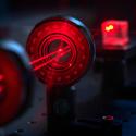 A laser beam shines through optical components in a Gallatin College photonics lab Monday, Feb. 7, 2022, in a Montana State University lab in Bozeman, Mont. MSU photo by Kelly Gorham