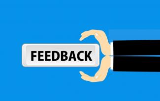 cartoon of the word "feedback"