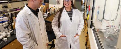 Aaron Thomas, director of UM Indigenous Research and STEM Education, speaks with Ph.D. student Sierra Paske in the UM Chemistry Building. (Photos by Tommy Martino)