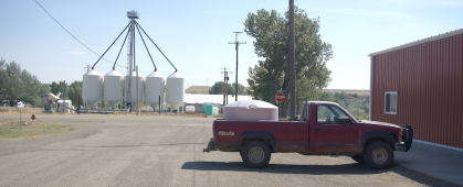 Private water fill truck in Ryegate, MT. Many Central Montanans who reside outside city limits haul water from communal fill stations. Credit: Grete Gansauer