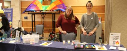 Staff from SMRC pose in front of the SMART FIRES table