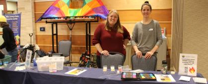 Staff from SMRC pose in front of the SMART FIRES table